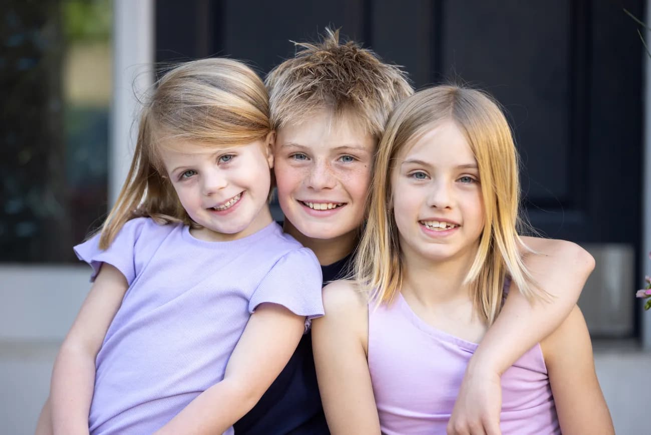 Wes and Laura Rogers's three children together in Kansas City